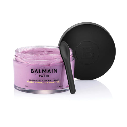 Balmain Paris illuminating mask with a black spoon on a white background